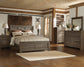 Juararo Queen Panel Bed with Mirrored Dresser, Chest and Nightstand