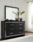 Kaydell King Upholstered Panel Bed with Mirrored Dresser